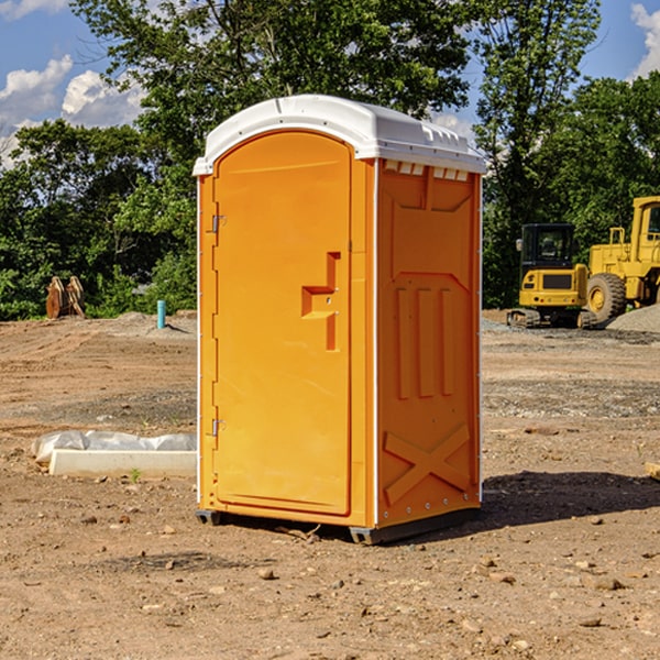 what is the cost difference between standard and deluxe portable restroom rentals in Mosby